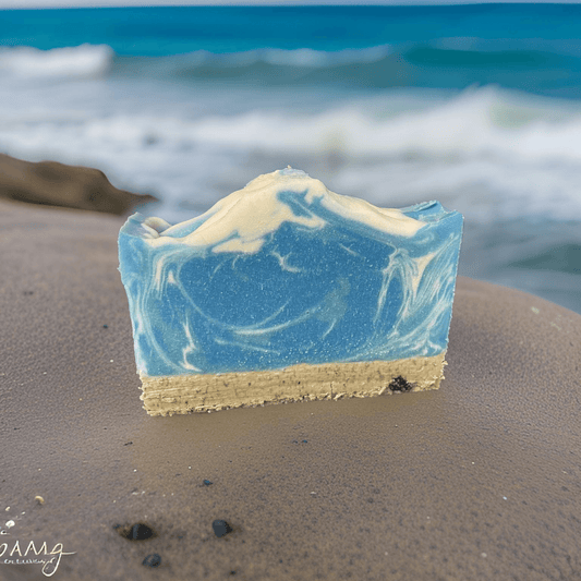 Surf All-Natural Vegan Soap for Luxurious Skincare, featuring blue and beige swirls and a beach backdrop.