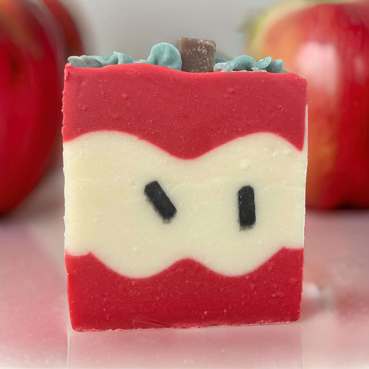 Handcrafted apple soap for teachers with vibrant colors, a vegan gift for soft skin, perfect for educators.