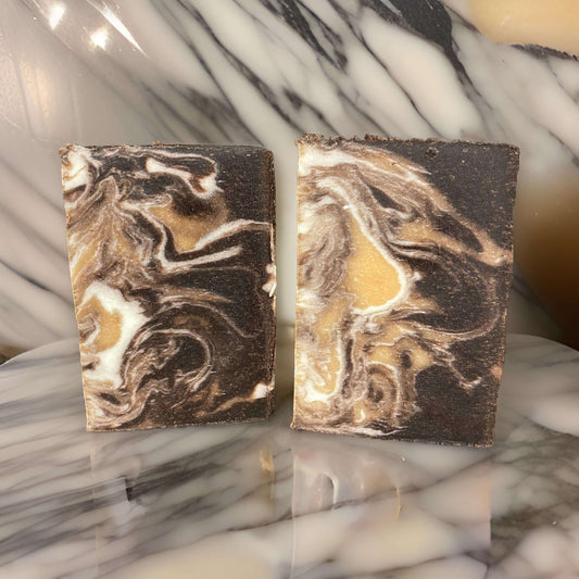 Vegan Bourbon Butterscotch Soap - Luxe Skin Indulgence showcasing swirled colors of butterscotch and bourbon.