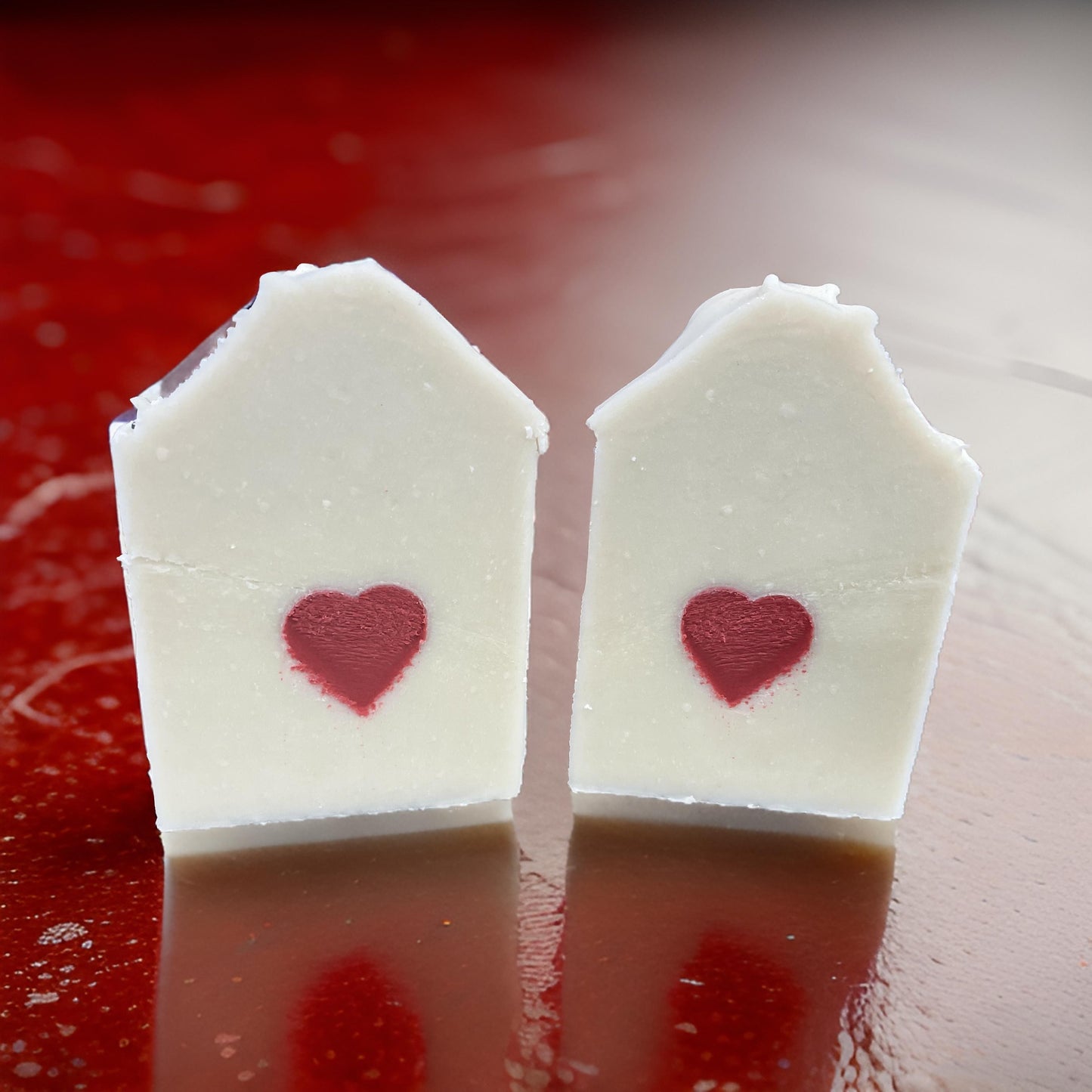 Handcrafted soap with fruity scents My Heart Is Yours shaped like houses with red heart design.