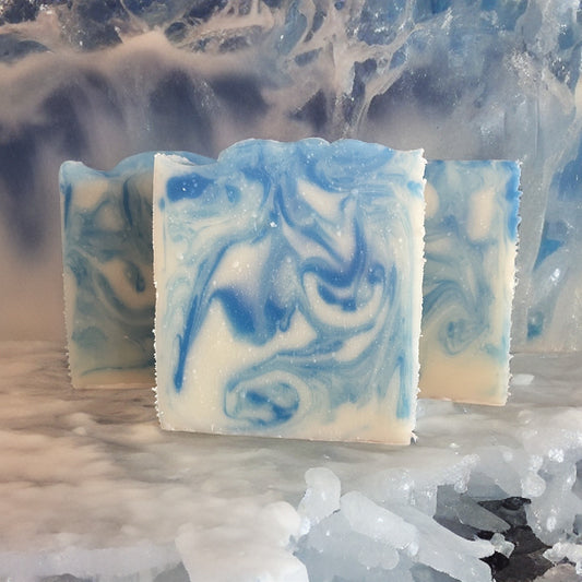 Glacier Falls Soap with blue swirls on a white base, evoking the cool spirit of mountain meltwater.